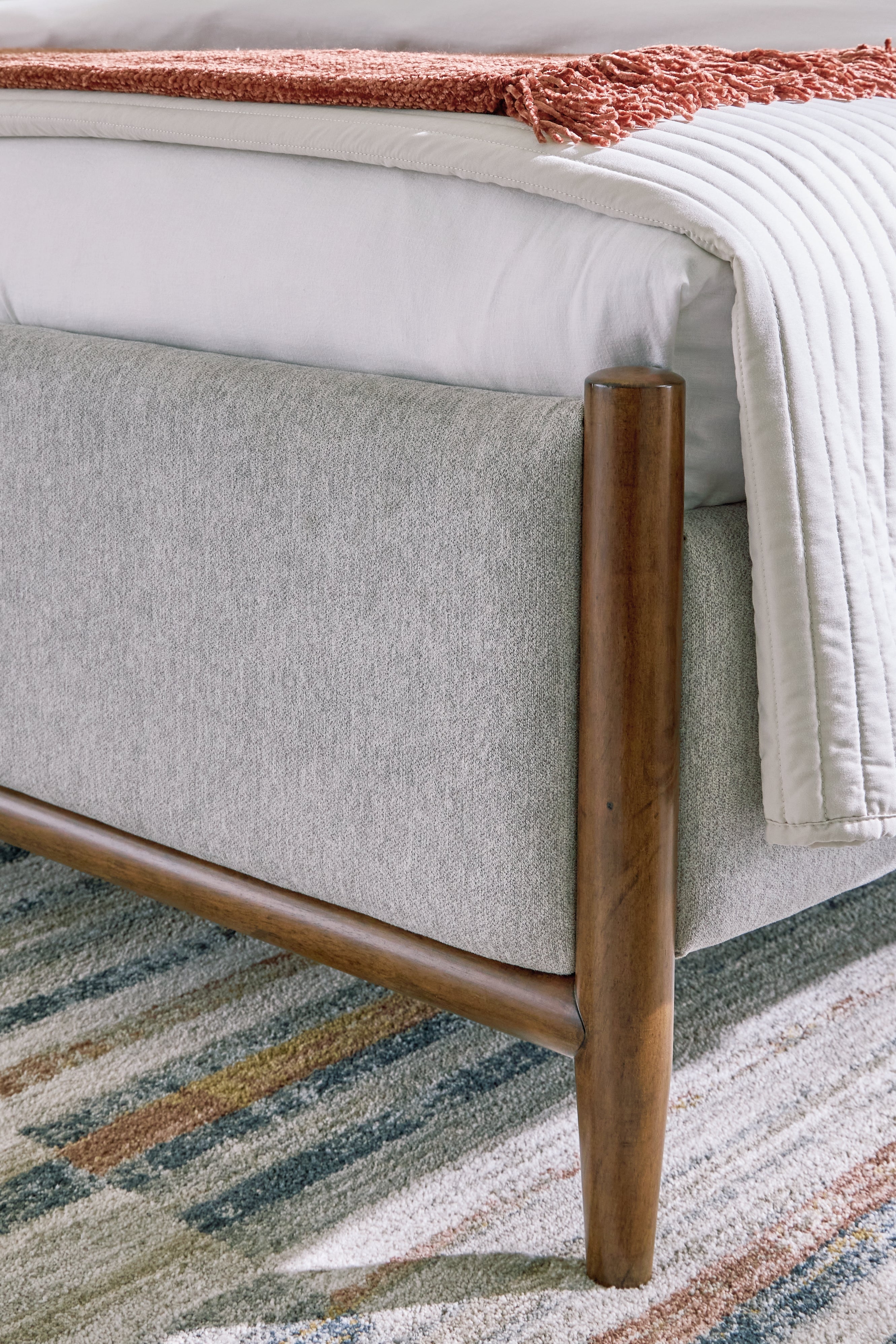 Lyncott Queen Upholstered Panel Bed